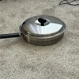 Stylish Stainless Steel Cookware with Black Handle